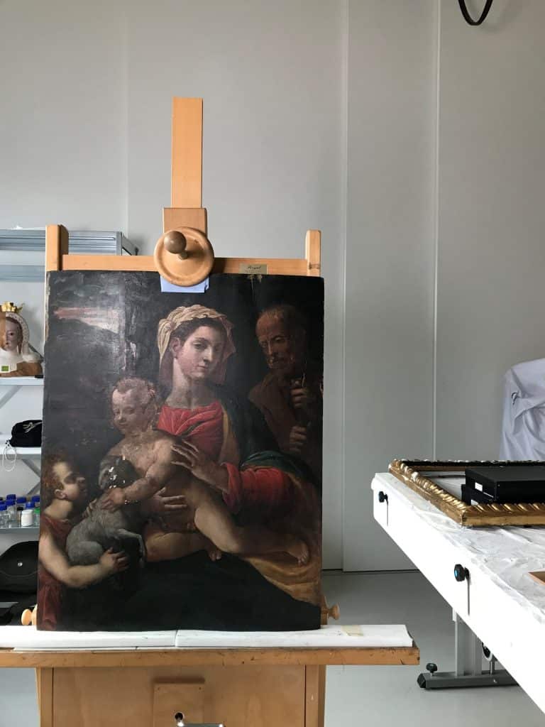 Das Gemälde "Die Heilige Familie mit dem Johannesknaben" während der Restaurierung